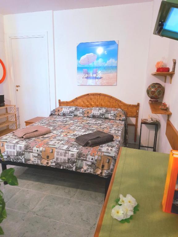 Postel nebo postele na pokoji v ubytování LA QUERCIA SUITES - taverna nel borgo medievale