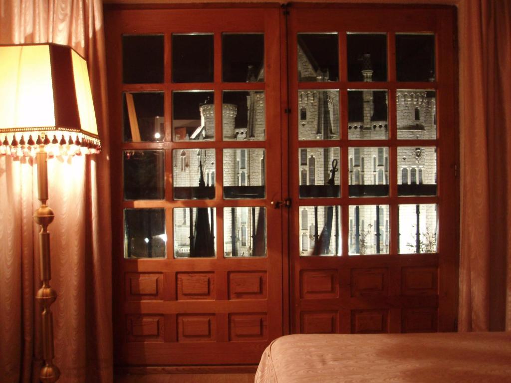 Postel nebo postele na pokoji v ubytování Hotel Gaudi