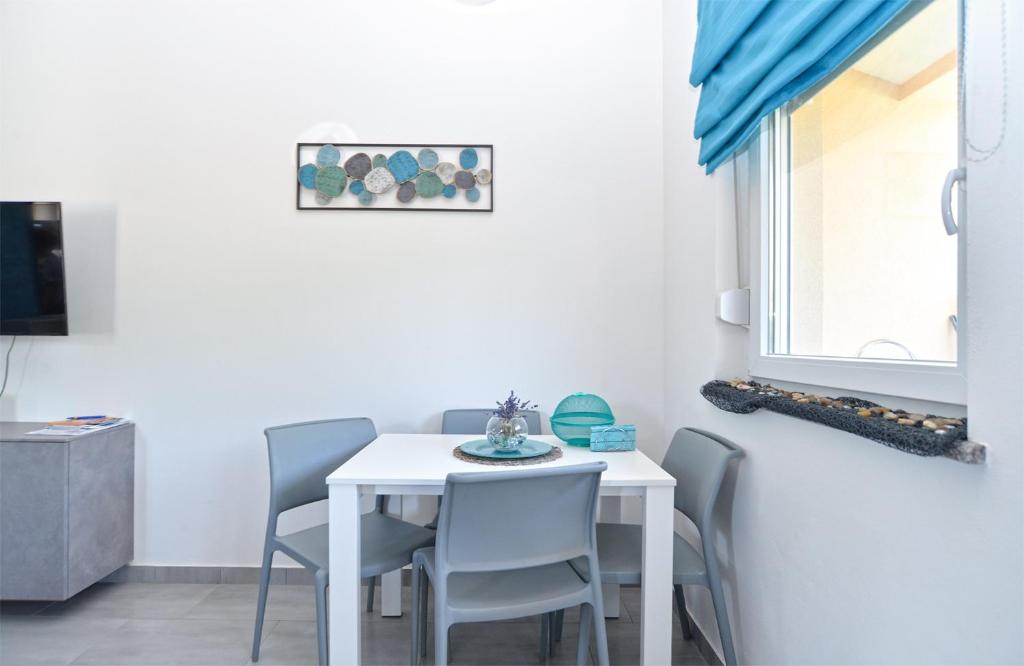 Televízia a/alebo spoločenská miestnosť v ubytovaní House Peroj 2195