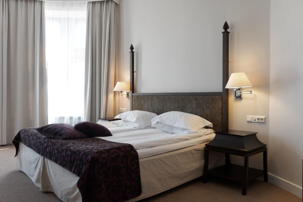 Postel nebo postele na pokoji v ubytování Elite Stadshotellet Luleå