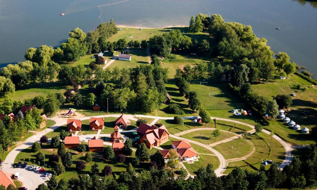 an aerial view of an island with a resort at Aquatherma Termálfalu és Kemping in Zalaegerszeg