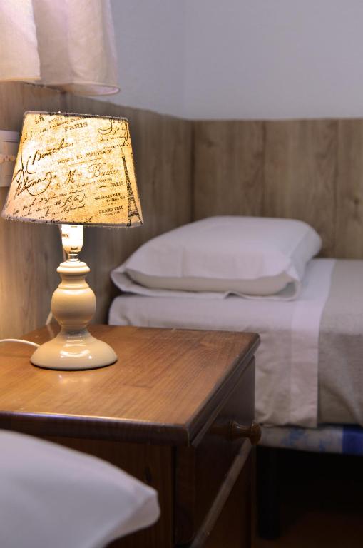 Letto o letti in una camera di La Coma