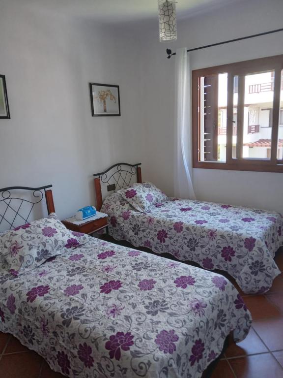 Postel nebo postele na pokoji v ubytování Cabo Dream