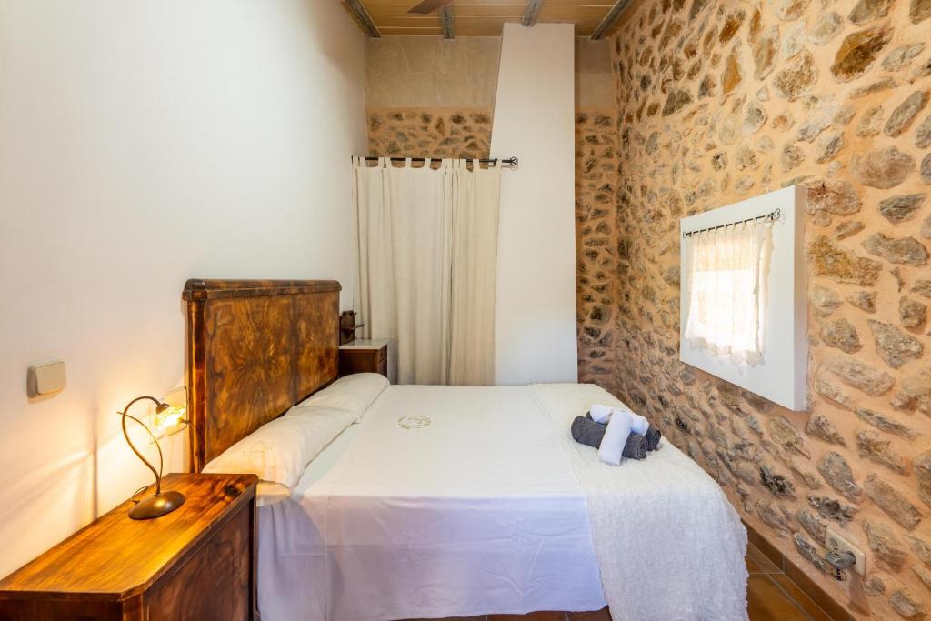 A bed or beds in a room at Manacor - 39698 Mallorca