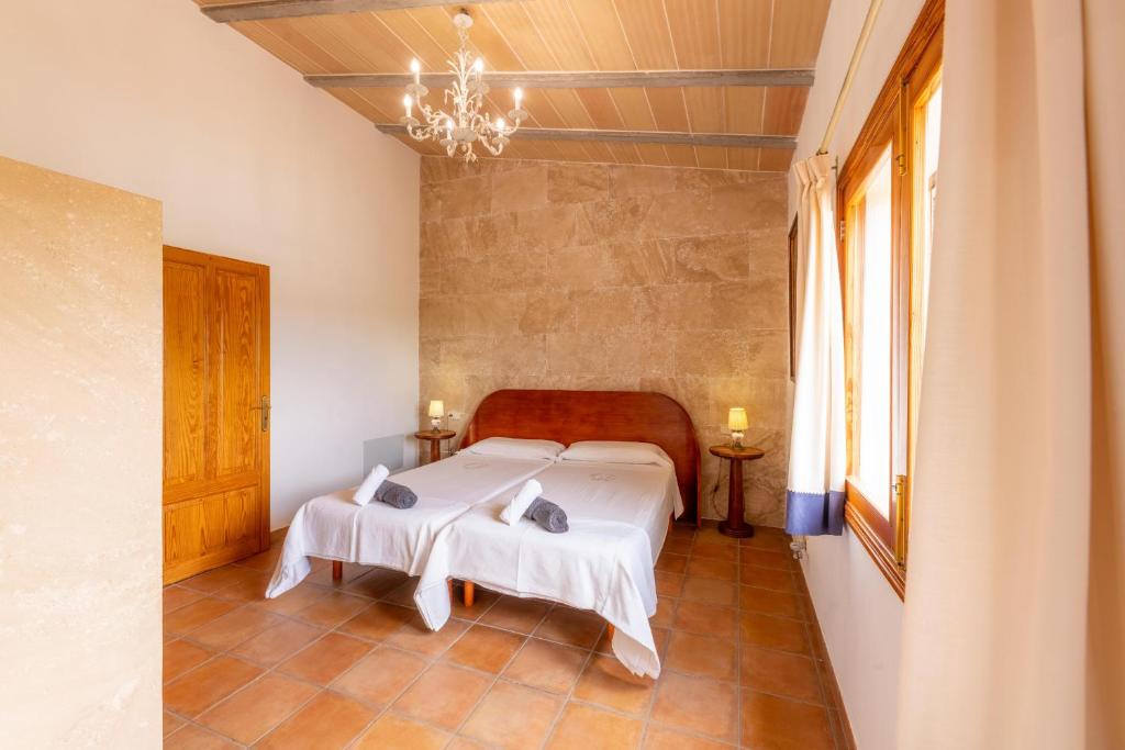 A bed or beds in a room at Manacor - 39698 Mallorca