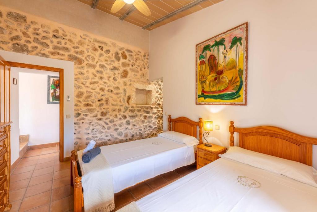 A bed or beds in a room at Manacor - 39698 Mallorca