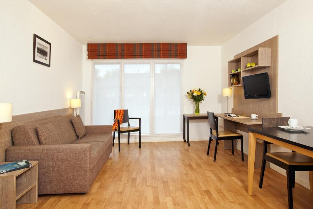 Posezení v ubytování Residhome Genève Prévessin Le Carré d'Or
