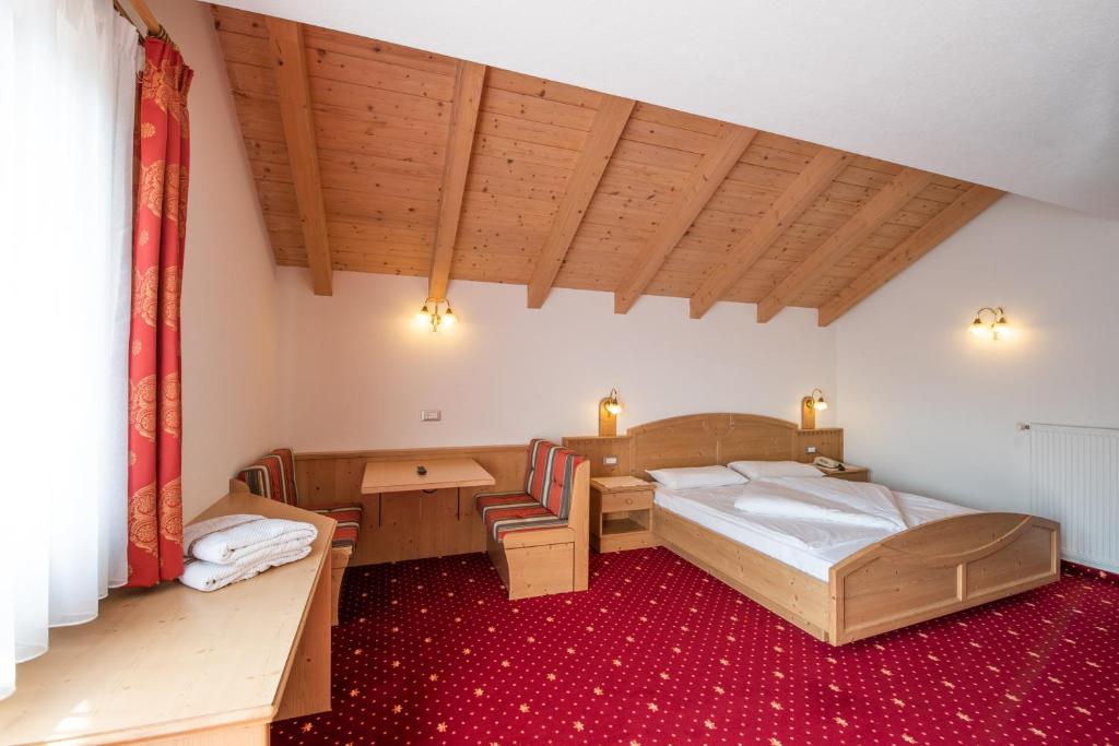Posteľ alebo postele v izbe v ubytovaní Residence Mühlegg