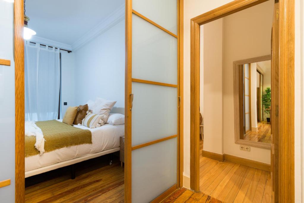 A bed or beds in a room at Pozas by Staynnapartments