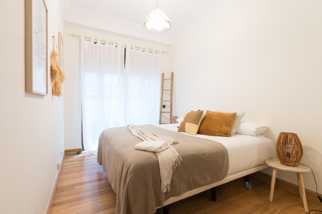 A bed or beds in a room at Pozas by Staynnapartments