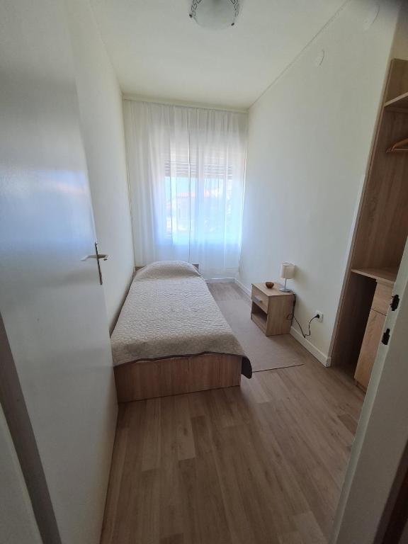 Posteľ alebo postele v izbe v ubytovaní Apartments Bianca