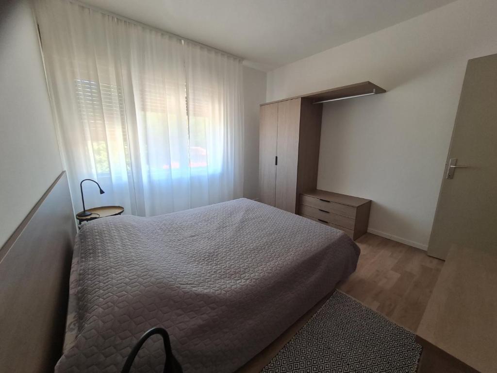 Posteľ alebo postele v izbe v ubytovaní Apartments Bianca