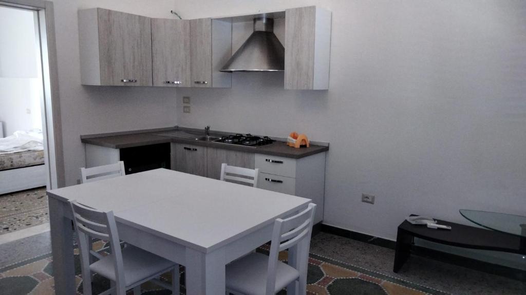 A kitchen or kitchenette at Casa Vacanze Lu Trappitu
