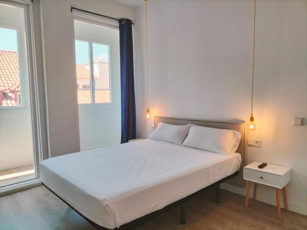 Hostal Manuela by gaiarooms客房内的一张或多张床位