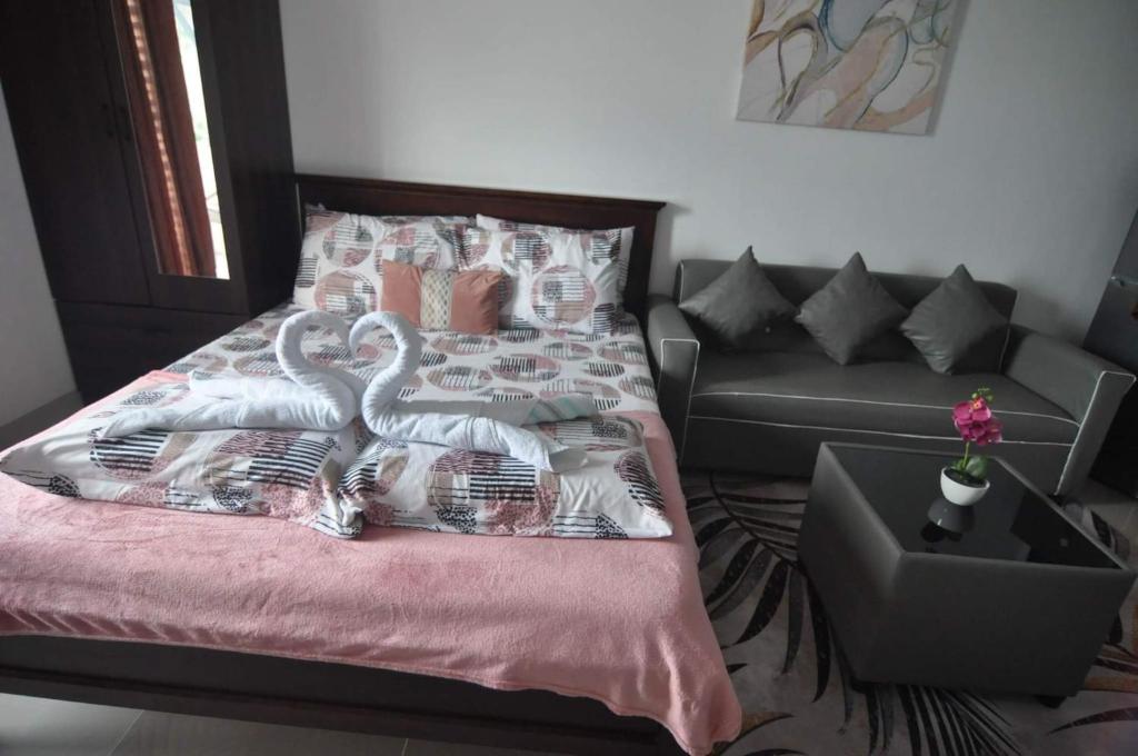 Letto o letti in una camera di Saekyung Condominium