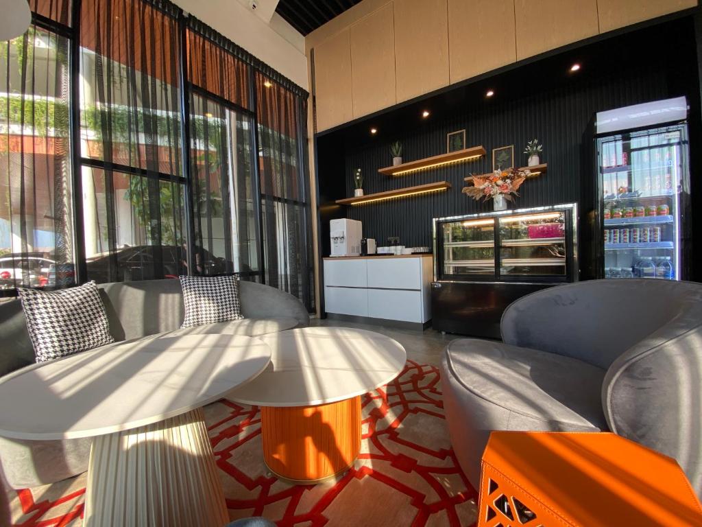 Posezení v ubytování OTEL Hotel Suite