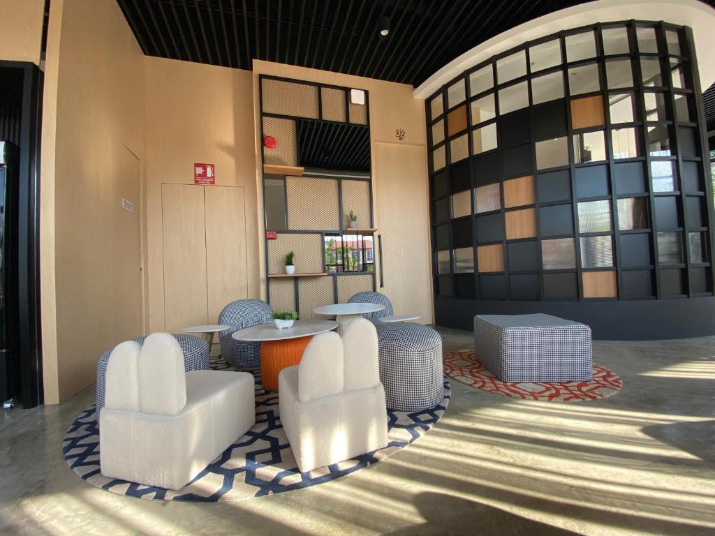 Posezení v ubytování OTEL Hotel Suite
