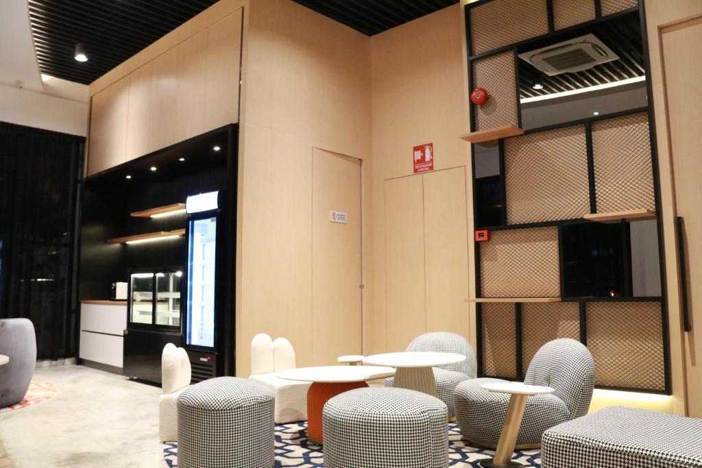 Posezení v ubytování OTEL Hotel Suite