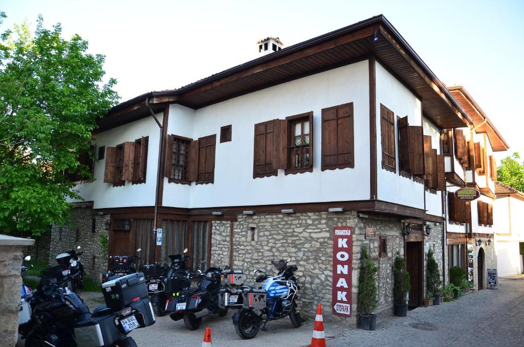 a group of motorcycles parked in front of a building at Yorgancıoglu Konak in Safranbolu