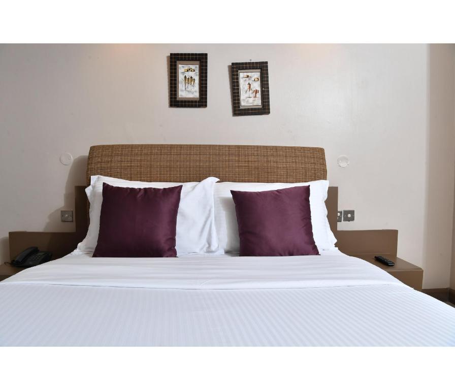 Postel nebo postele na pokoji v ubytování Hillpark Hotel