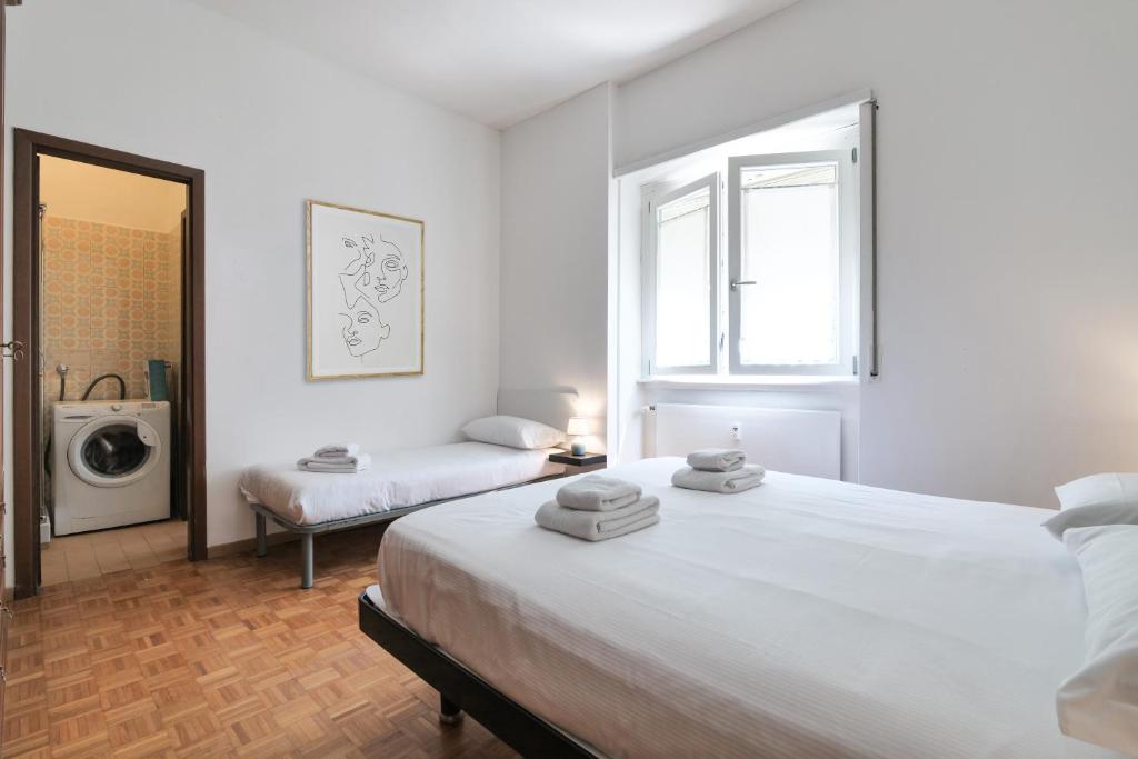 A bed or beds in a room at PrimoPiano - Pellegrino Rossi A