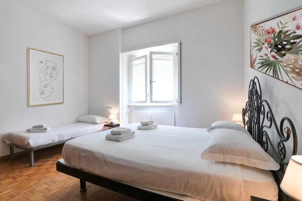 A bed or beds in a room at PrimoPiano - Pellegrino Rossi A