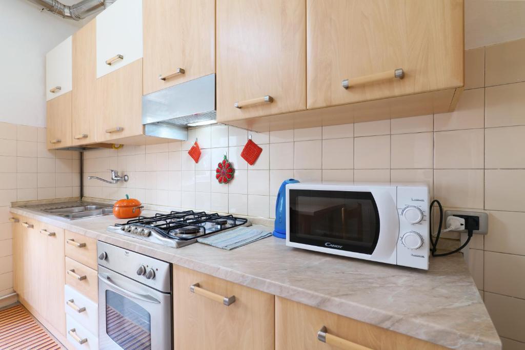 A kitchen or kitchenette at PrimoPiano - Pellegrino Rossi A