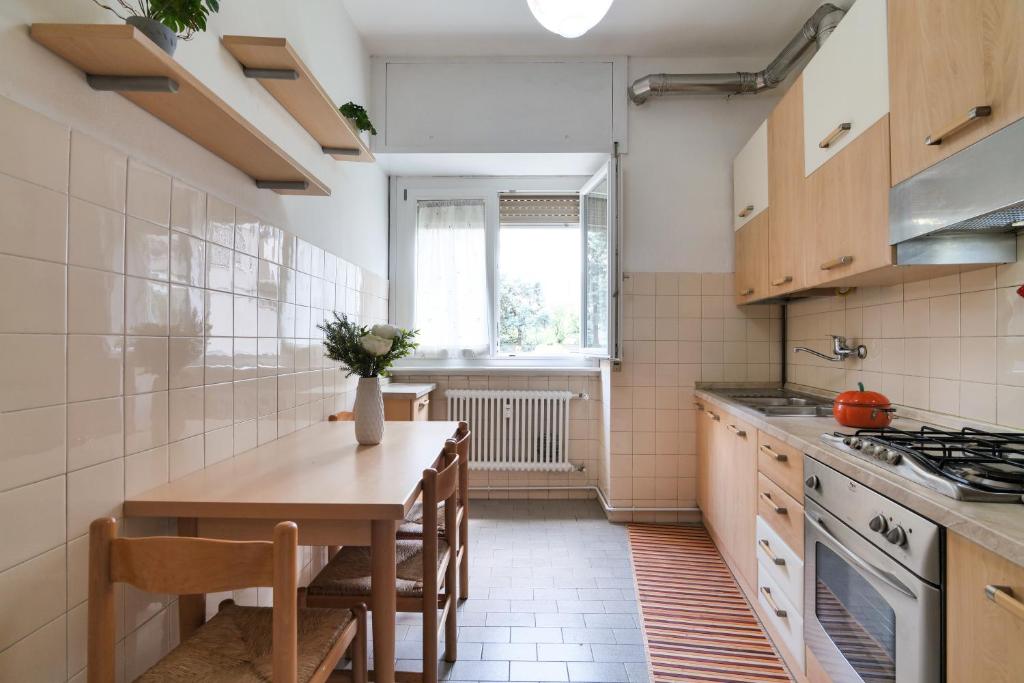 A kitchen or kitchenette at PrimoPiano - Pellegrino Rossi A