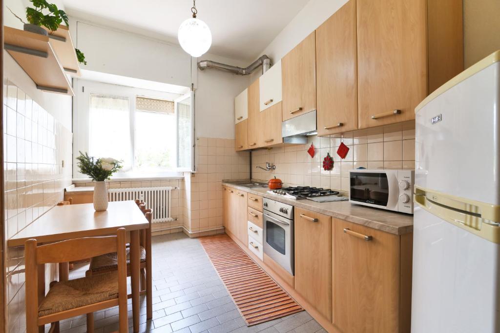 A kitchen or kitchenette at PrimoPiano - Pellegrino Rossi A