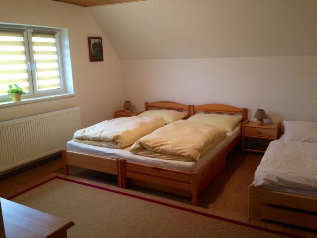 Posteľ alebo postele v izbe v ubytovaní Apartment U Anděla