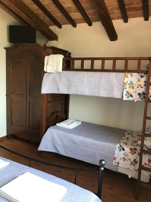 Postel nebo postele na pokoji v ubytování Il vecchio seccatoio