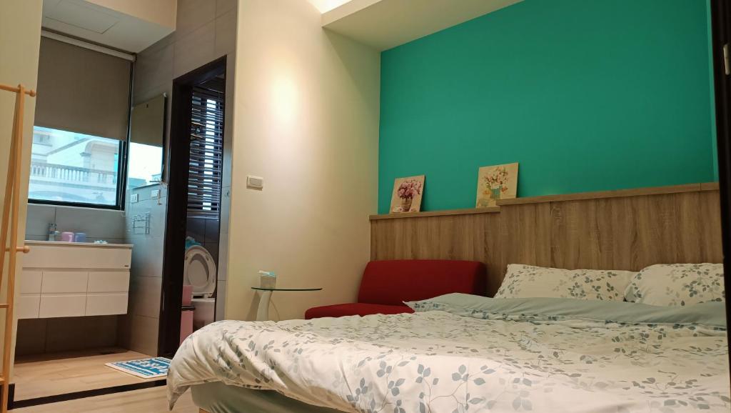 Postel nebo postele na pokoji v ubytování 禾心居He Xin Ju Homestay