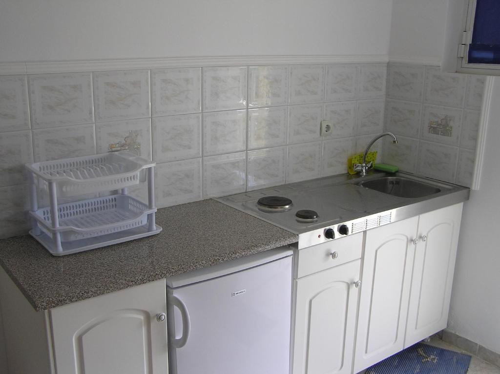 Kuchyň nebo kuchyňský kout v ubytování Casa Dyonisia Tsilivi