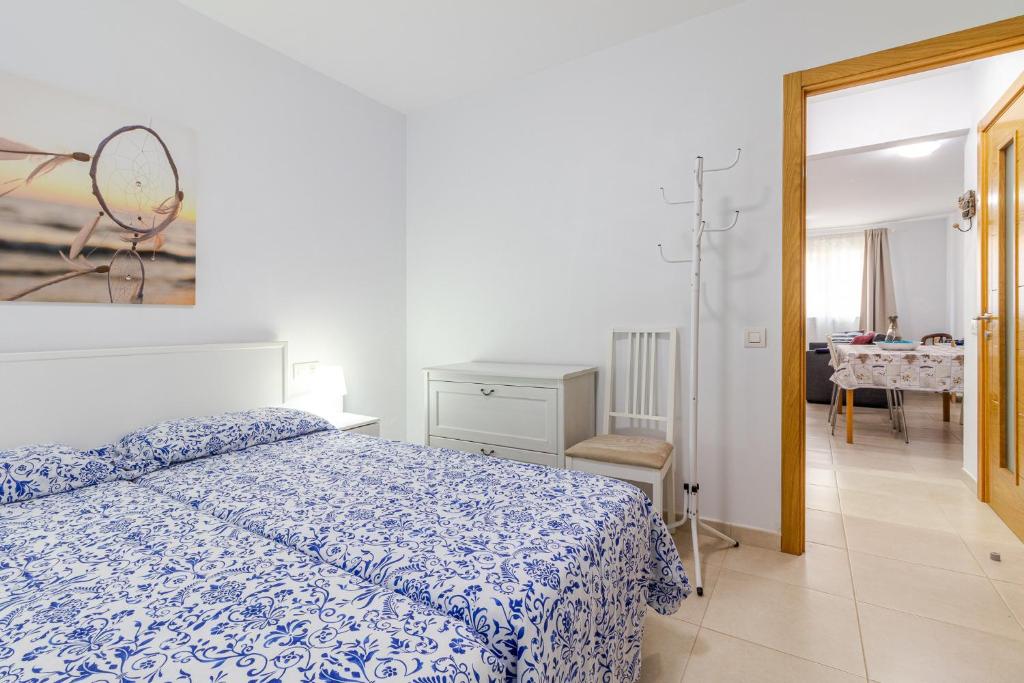 Posteľ alebo postele v izbe v ubytovaní Flatguest Arinaga Playa 2 - Pez