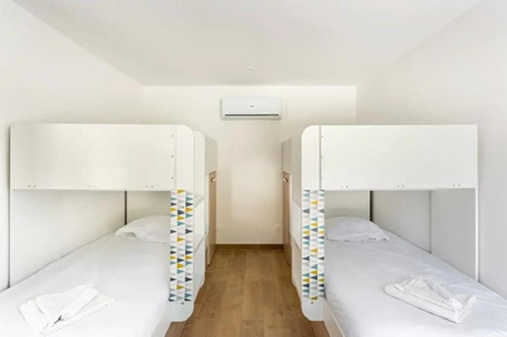 Postel nebo postele na pokoji v ubytování La Grignotière Lodge & Spa