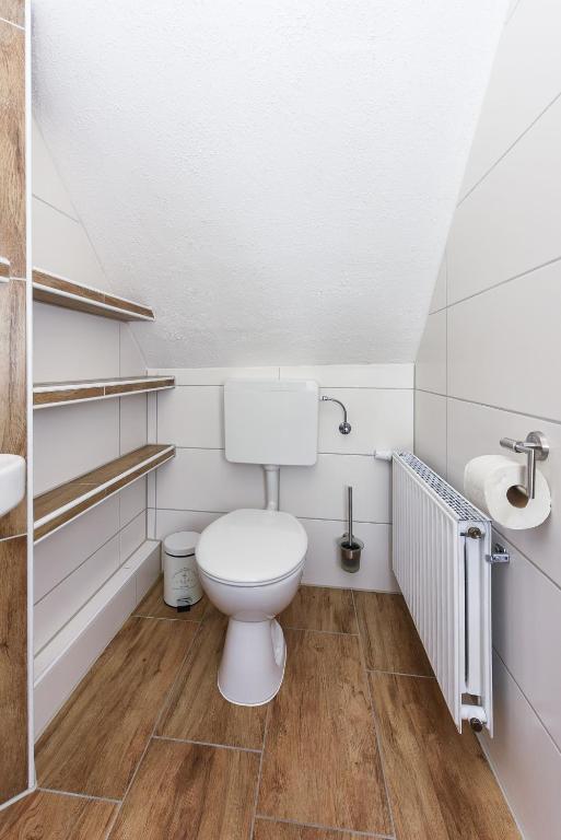 Koupelna v ubytování Friesenmeer Ferienwohnung Vier