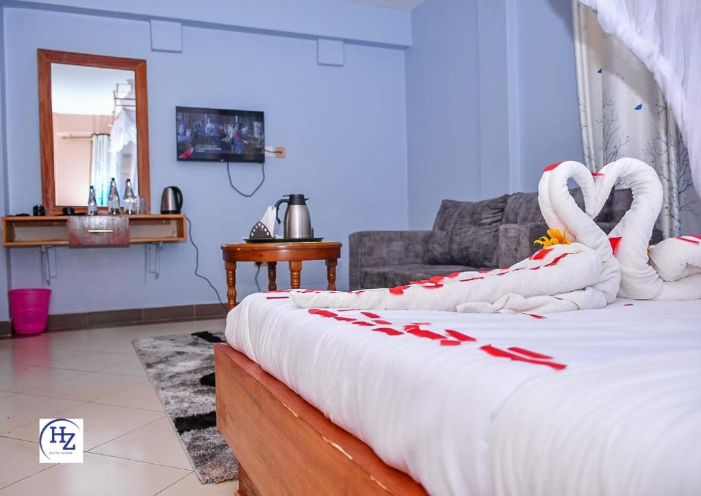 Postel nebo postele na pokoji v ubytování Hotel Zesper