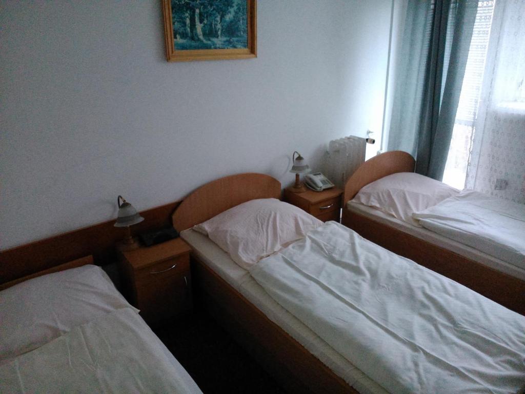 Postel nebo postele na pokoji v ubytování Hostel Refleks