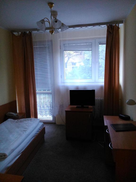 Postel nebo postele na pokoji v ubytování Hostel Refleks
