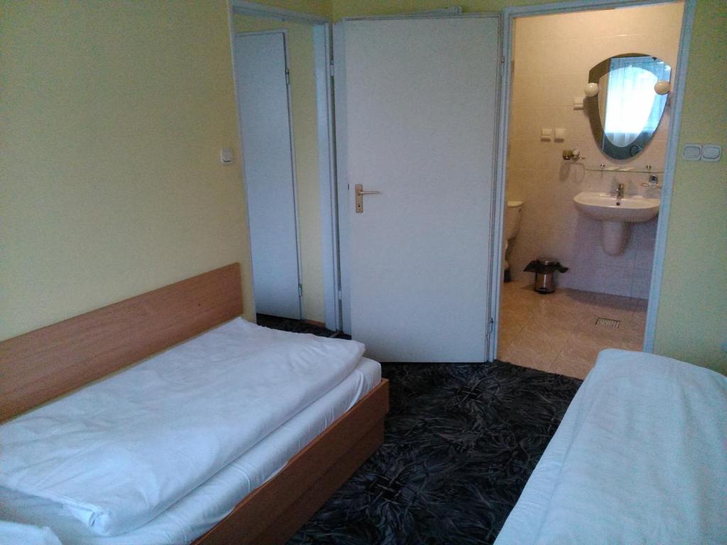 Postel nebo postele na pokoji v ubytování Hostel Refleks