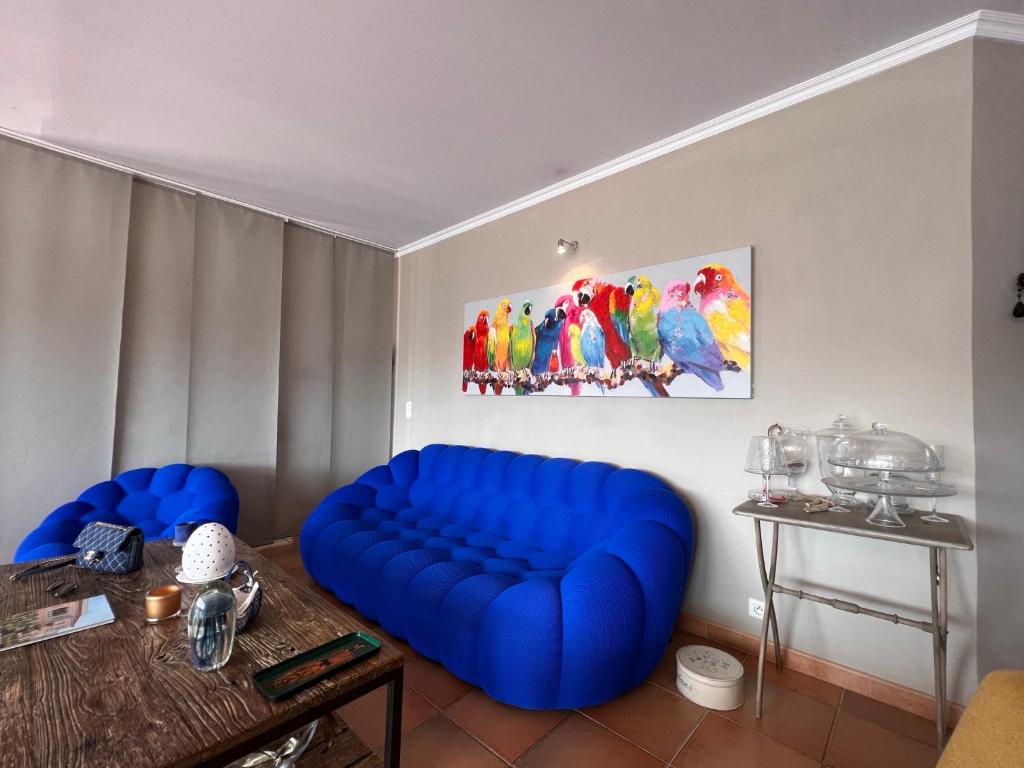 Ein Sitzbereich in der Unterkunft Les Grimaldines - Maison d&#39;Hôtes