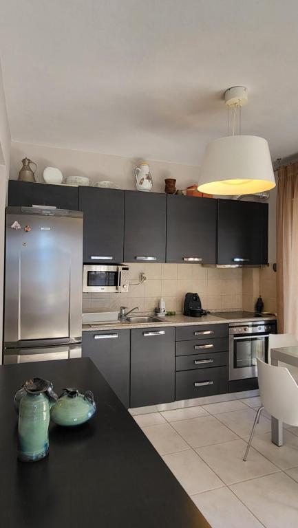 Kuchnia lub aneks kuchenny w obiekcie Evita Maisonette, Elegant Beachfront apt, Polychrono