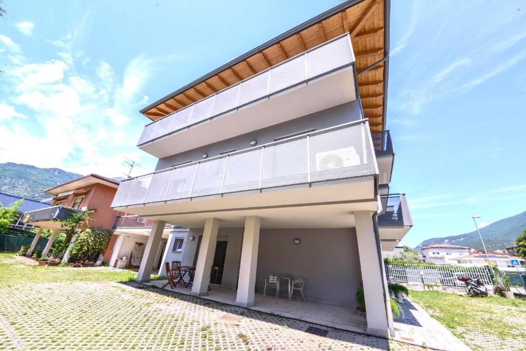 a house with a large window on the side of it at 1Dest - Easy Modern in Arco