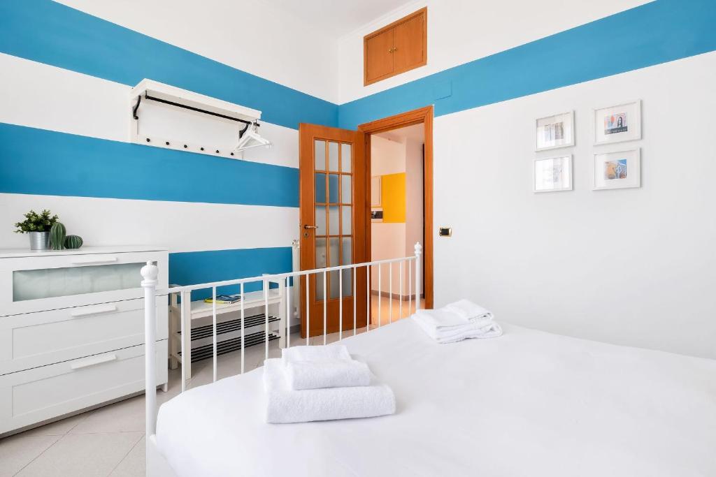 A bed or beds in a room at Luce San Lorenzo by Halldis