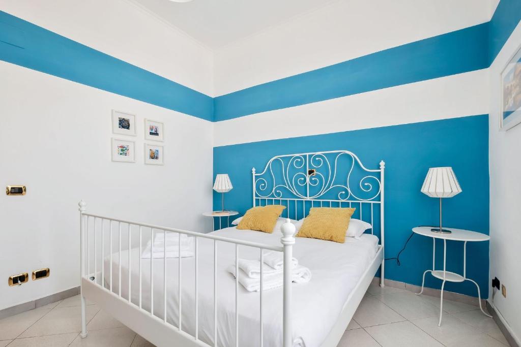A bed or beds in a room at Luce San Lorenzo by Halldis