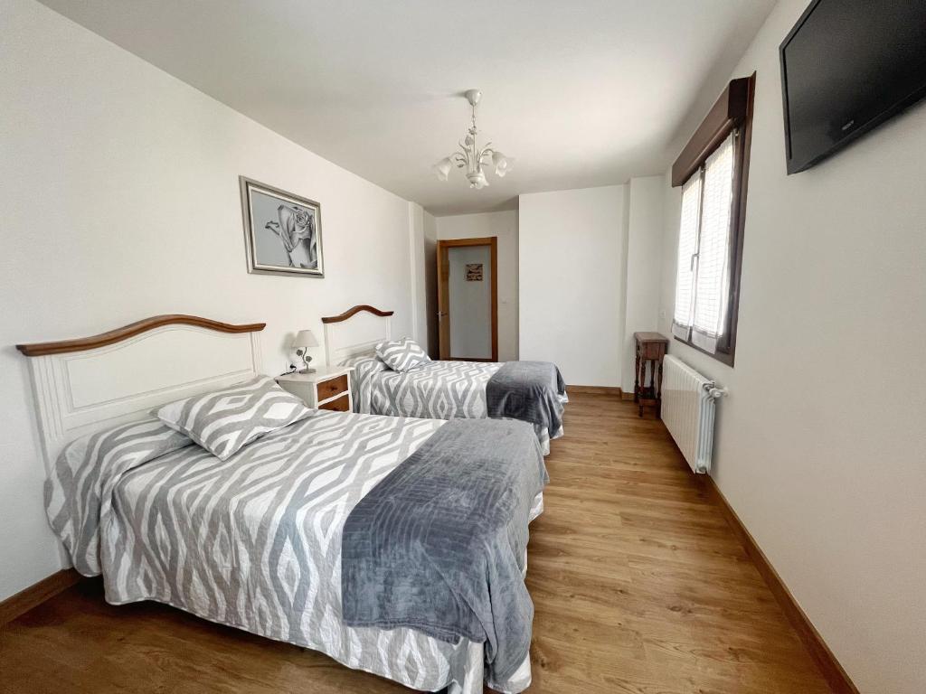 Postel nebo postele na pokoji v ubytování Apartamento Valbuena