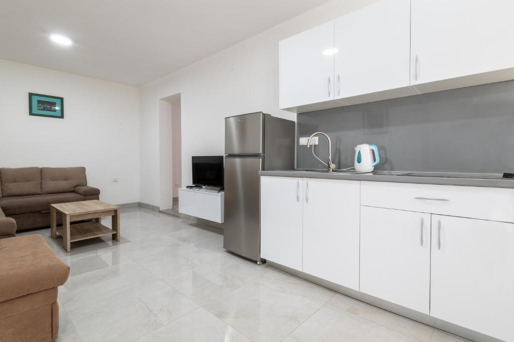 Kuchyň nebo kuchyňský kout v ubytování Apartmani Dodig