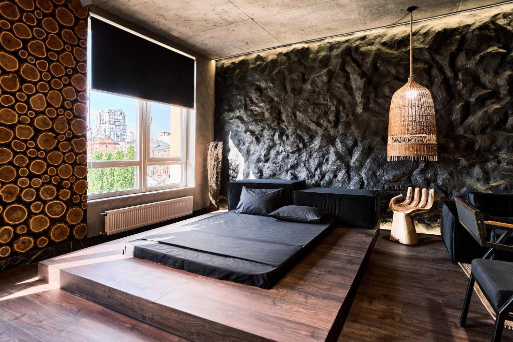 Postel nebo postele na pokoji v ubytování KADOR HOME HOTEL downtown
