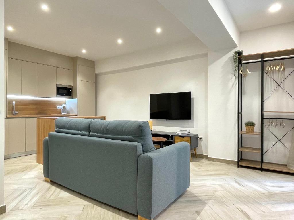 Televízia a/alebo spoločenská miestnosť v ubytovaní Loft Marbella centro