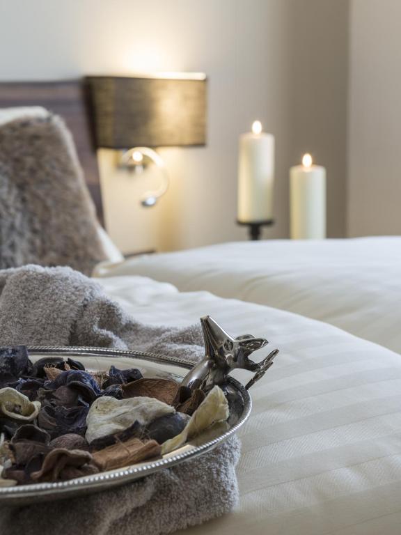 Postel nebo postele na pokoji v ubytování Hotel Cervo